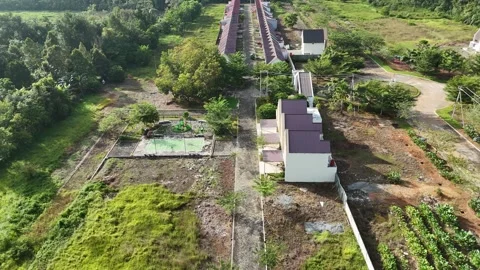 Aerial Drone View of Rural Complex with White Buildings and Purple Roofs 스톡 동영상 342090152