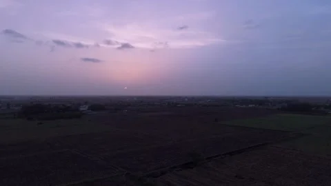 Aerial Drone View of Rural Farmland at Sunrise with Dramatic Morning Sky Stock Footage 337959341