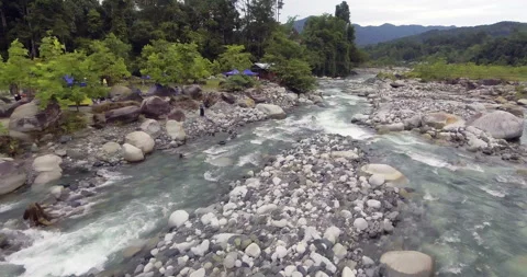 Aerial Drone View of Rural Settlement with Solar Panels by River, Sabah 스톡 동영상 335475192