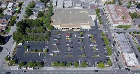 Aerial drone view of safeway grocery store with parking lot Stock Footage 118823876