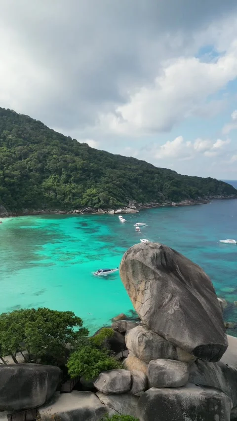 Aerial Drone View of Sail Rock Formation and Turquoise Tropical Bay Stock Footage 341008196