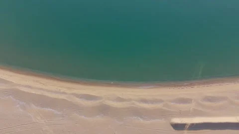 Aerial Drone View Of Sandy Beach And Clear Turquoise Sea Stock Footage 330105113