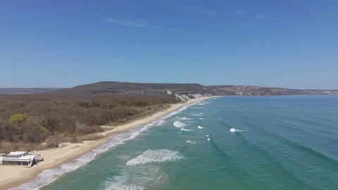 Aerial drone view of sandy beach coastline and blue sea Stock-Footage 332938951