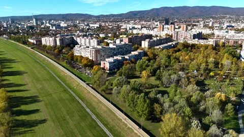 Aerial drone view of Sava river and Zagreb skyline on sunny autumn day, Zagreb Stock Footage 324610238