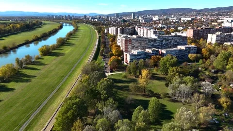 Aerial drone view of Sava river and Zagreb skyline on sunny autumn day, Zagreb Stock Footage 324610340