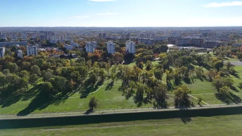 Aerial drone view of Sava river and Zagreb skyline on sunny autumn day, Zagreb Stock Footage 324610418