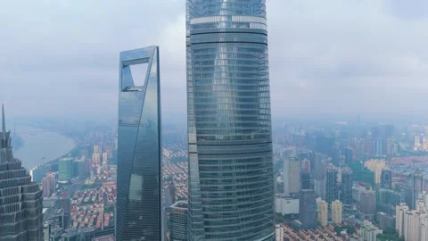 Aerial drone view of the Shanghai Tower and Shanghai World Financial Center Stock Footage 327371292