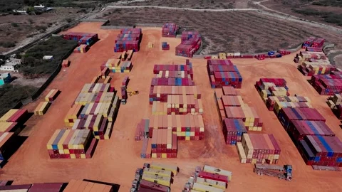 Aerial drone view of shipping container yard and cargo storage area near Video stock 342318498