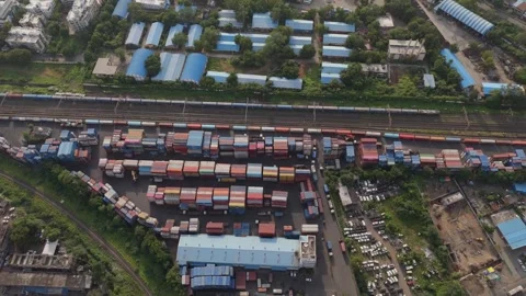 Aerial drone view of shipping container yard and logistics terminal Stock Footage 345463105