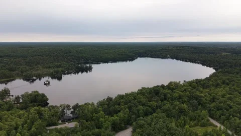 Aerial Drone View of Silver Lake on an Overcast Evening, Kawartha Lakes, Ontario Stock Footage 342163497