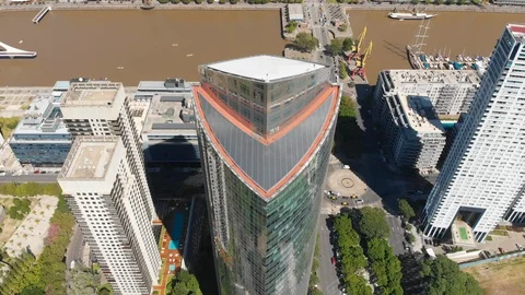 Aerial drone view of skyscraper building roof in Puerto Madero, Buenos Aires Stock Footage 100888024