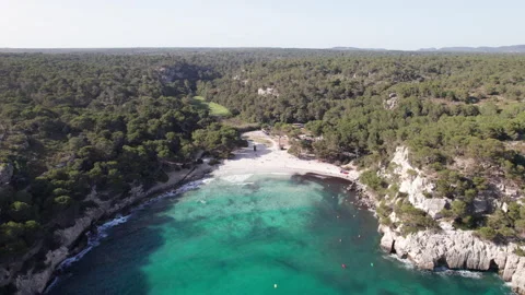Aerial drone view slow orbit Menorca Cala Macarelleta and Macarella Stock Footage 238991380