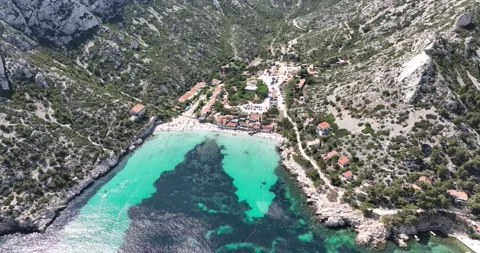 Aerial drone view of a small beach in the Calanque national park next to the Stock Footage 247439221