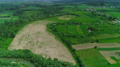 Aerial drone view of small community situated in beautiful landscape. 4K. Stock Footage 113202806