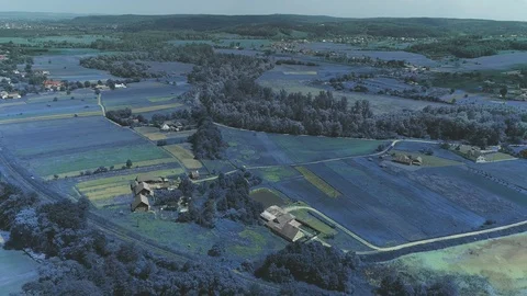 Aerial drone view of small community situated in beautiful landscape. 4K. Stock Footage 113205342