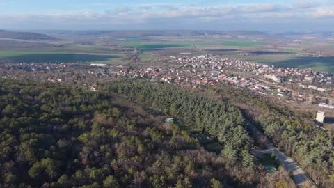 Aerial drone view of small town surrounded by countryside landscape Stock Footage 324529678