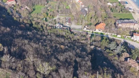 Aerial drone view of small town surrounded by countryside landscape Stock Footage 324529832