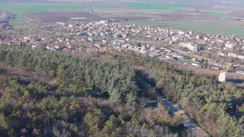 Aerial drone view of small town surrounded by countryside landscape Stock Footage 324529833