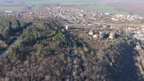 Aerial drone view of small town surrounded by countryside landscape Stock Footage 324529848