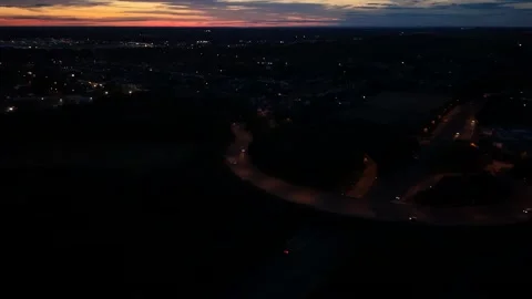 Aerial Drone View of Small Town Roads, Cars and Nature at Sunset Stock Footage 341625570