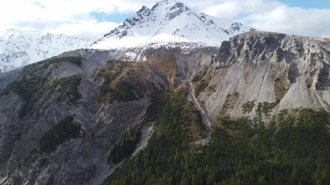 Aerial Drone View of Snow-Capped Swiss Alps Mountains in Autumn Stock Footage 327974800