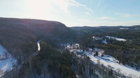 Aerial Drone View of Snow Covered Luxury Mansion Near Devils Pulpit in Forks Of Stock Footage 328912398