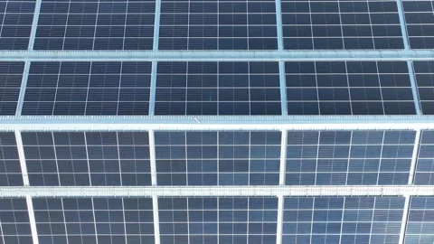 Aerial drone view of solar panel rooftop on a shopping mall. 스톡 동영상 334790847