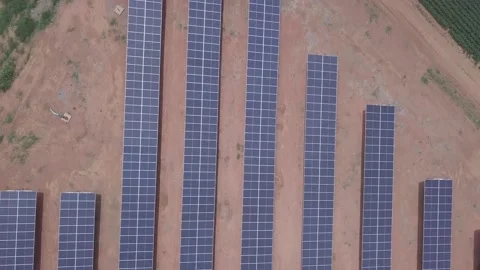 Aerial drone view of solar panels on sunny summer day to generate clean energy Stock Footage 149071385
