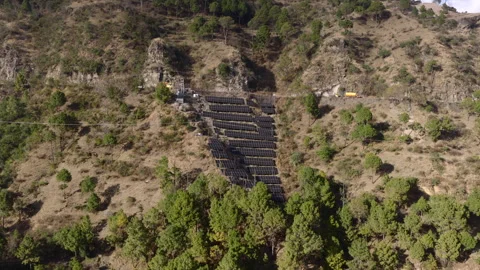 Aerial Drone View of Solar Panels Installed on Mountain Hillside Stock Footage 331229054