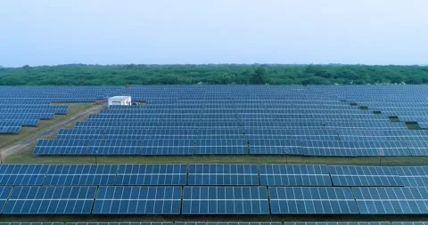 Aerial Drone View of Solar Power Plant and Renewable Energy in Gujarat, Indi Stock Footage 341384293