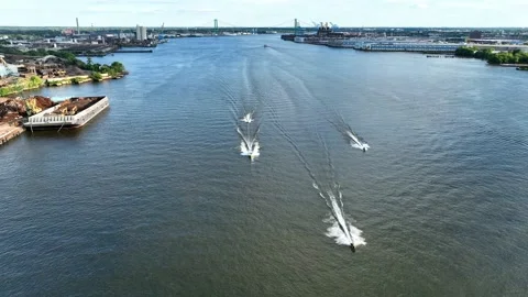 Aerial Drone View of Speeding Jet Skis and Boat on River Stock Footage 204502572