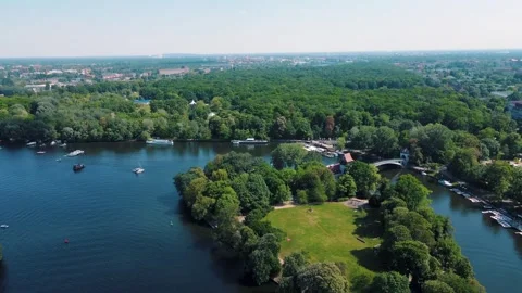 Aerial drone view of Spree River and Insel der Jugend near Treptower Park B.. Video stock 243815061