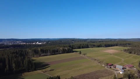 Aerial drone view of spring forest and fields in sunny countryside Germany Stock-Footage 330268348