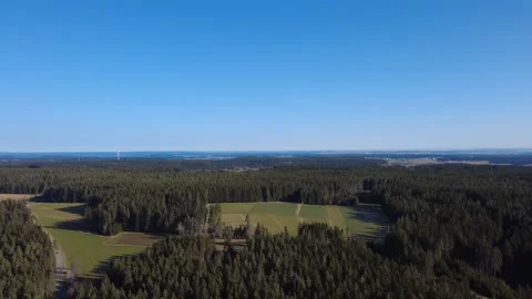 Aerial drone view of spring forest and fields in sunny countryside Germany Stock Footage 330268357