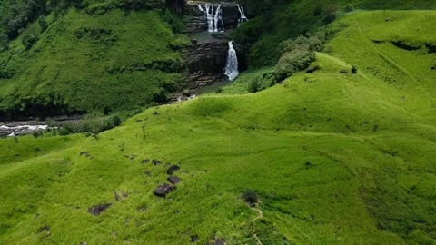 Aerial Drone View of St. Clair’s Waterfall with Lush Green Surroundings Video stock 306744801
