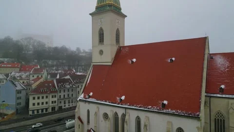 Aerial drone view St. Martin's Cathedral rising above Bratislava during sno.. Stock Footage 303384309