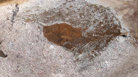 Aerial drone view of stack of different types of large mountain garbage pile 動画素材 164896387