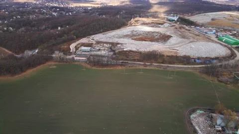 Aerial drone view of stack of different types of large mountain garbage pile Video stock 164896543