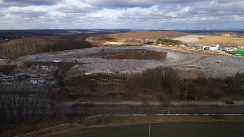 Aerial drone view of stack of different types of large mountain garbage pile 動画素材 164897100