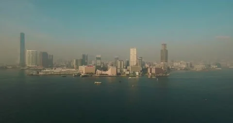 Aerial Drone View of Star Ferry Crossing Victoria Harbour to Kowloon, Hong Kong Stock Footage 136094468