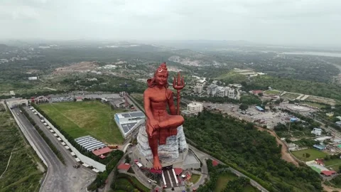 Aerial Drone View of Statue of Belief,  the world’s tallest Shiva statue Stock Footage 344538376