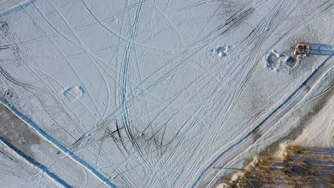 Aerial drone view straight down filming the frozen ice and revealing the ice Stock-Footage 164252255