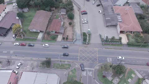 Aerial drone view of suburban intersection and urban traffic flow in Curitiba Stock-Footage 336643559
