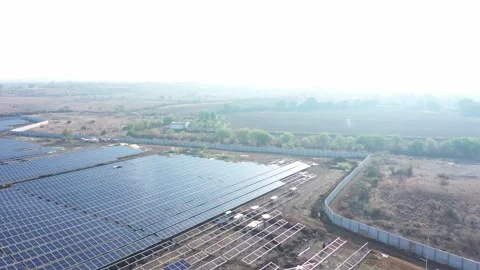 Aerial drone view Sun rays falling on solar panel in aerial drone view camera Stock Footage 263812550