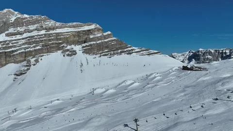Aerial drone view of sunny winter in dolomites, alps. Italy, Madonna di Cam.. Video stock 303889243