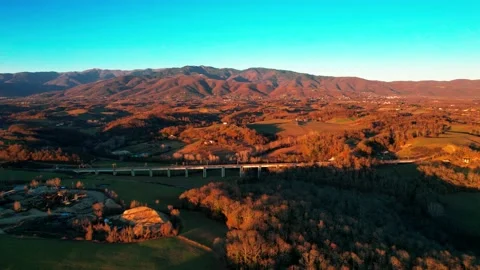 Aerial drone view sunset 4K High speed railbridge Tuscany Valdarno Italy Stock Footage 191201849