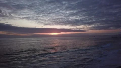 Aerial Drone view of a sunset at the Beach Stock Footage 329258957