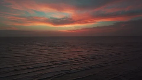 Aerial Drone View of Sunset Beach With Orange Sky Stock Footage 343420353