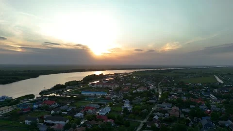 Aerial drone view of sunset over Saint George settlement in Danube Delta Stock Footage 283936209