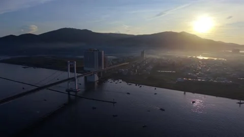 Aerial drone view of Thuan Phuoc Bridge at sunrise in Da Nang, Vietnam Vídeo Stock 340874690